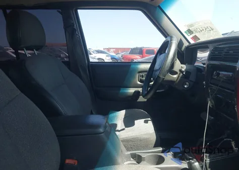 1999 Jeep Cherokee Classic/Sport z USA, uszkodzony, nr VIN 1J4FF68S9XL569501